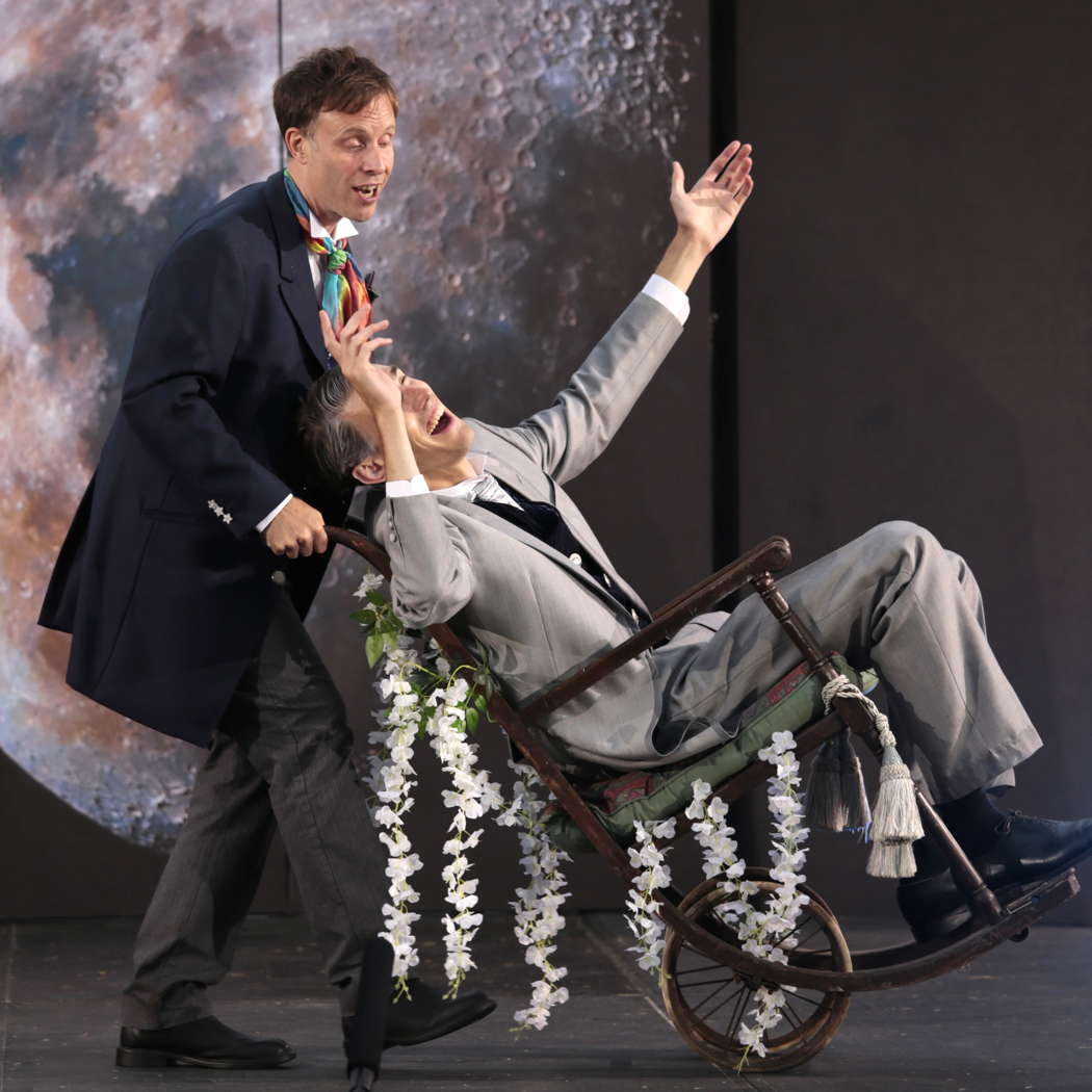 Ecclitico (Nathan Vale) wheels Bonafede (Jonathan Eyers) off for his Moonride in Bampton Classical Opera's 'Fool Moon'. Photo © 2022 Anthony Hall