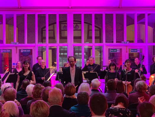 Frank Zielhorst (centre) and the strings of Sinfonia Viva acknowledging applause from the audience at Derby Central Library. Photo © 2019 Shain Bali?