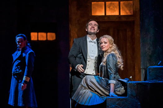 Erwin Schrott as Méphistophélès, Michael Fabiano as Faust and Irina Lungu as Marguerite in Gounod's 'Faust' at The Royal Opera. Photo © 2019 Tristram Kenton