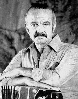 A photograph by Pupeto Mastropasqua of Astor Piazzolla in 1971, leaning on his bandoneon. Piazzolla created a 'nuevo tango' which incorporated elements of jazz, extended harmonies, dissonance, counterpoint and complex musical forms.