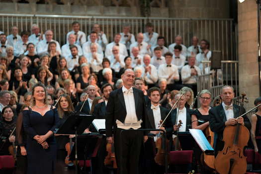 The enchanting soprano soloist Ilona Domnich joins Adrian Partington after a riveting final night's performance of Gustav Holst's 'The Mystic Trumpeter'. Photo © 2019 Michael Whitefoot