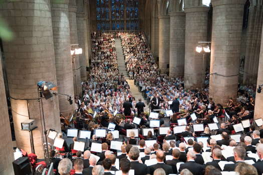 A view down the packed nave of Gloucester Cathedral as Adrian Partington directs the soloists in Berlioz's 'La damnation de Faust'. Photo © 2019 Michael Whitefoot