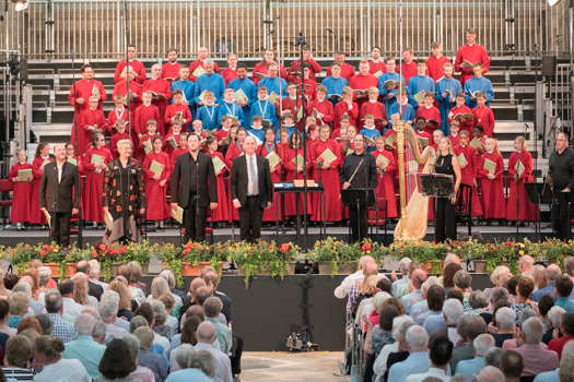 Adrian Partington and The Three Cathedral Choirs of Gloucester, Hereford and Worcester win their spurs in the first performance of Bob Chilcott's 'Christmas Oratorio'. Photo © 2019 Michael Whitefoot