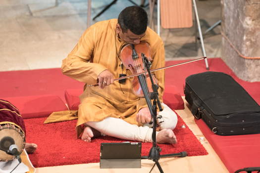 Bali Raguraman, playing the vertical violin in a mesmerising instrumental recital with Sri M Balachandar, beautifully expressive on the mridangam (oriental double drum). Photo © 2019 Michael Whitefoot