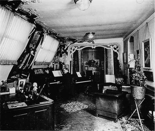 Lehár working in his flat in Theobaldgasse, Vienna in 1912, by Austrian photographer Charles Scolik (1854-1928)