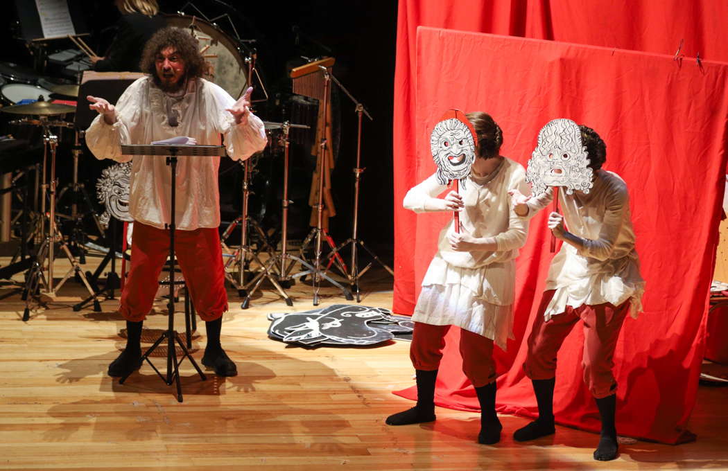 Nicola Franco as the narrator, with mimes, in 'L'asino magico di Tessaglia'. Photo © 2019 Marta Cantarelli