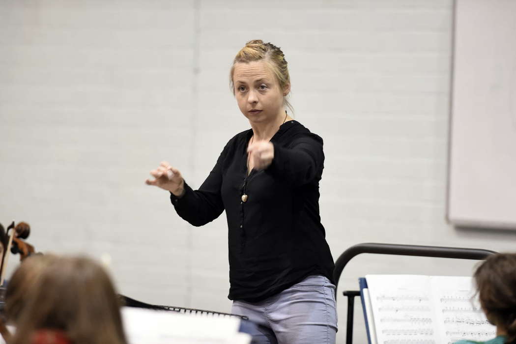 Holly Mathieson conducting the National Youth Orchestra of Scotland