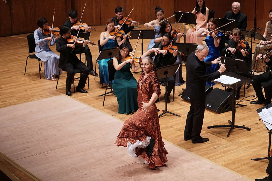 Nina Corti with Andrew Sewell and members of the City Chamber Orchestra of Hong Kong