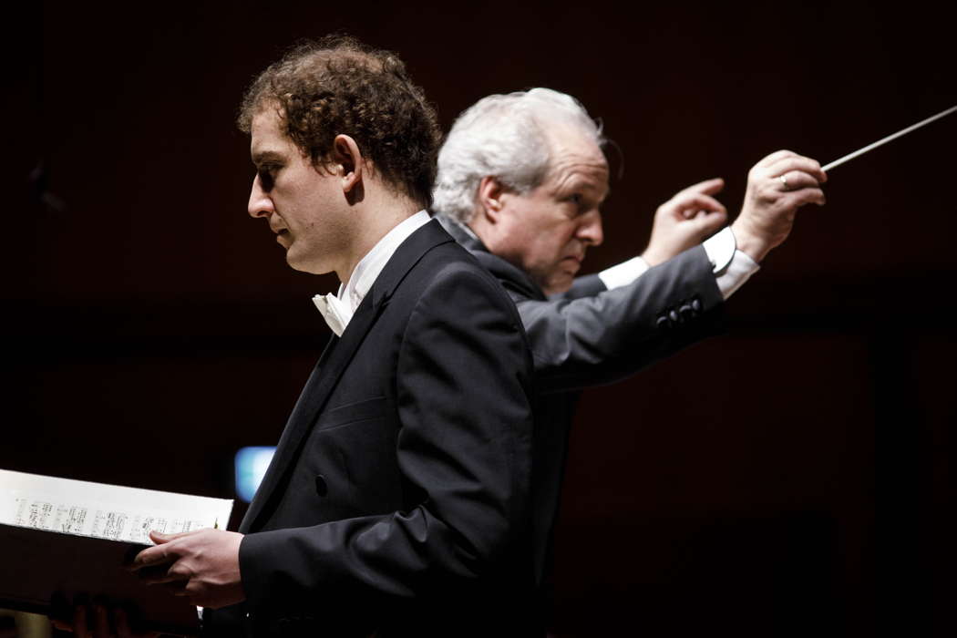 Tareq Nazmi, bass, with, behind him, Manfred Honeck conducting Haydn's 'Creation' in Rome. Photo © 2020 Riccardo Musacchio