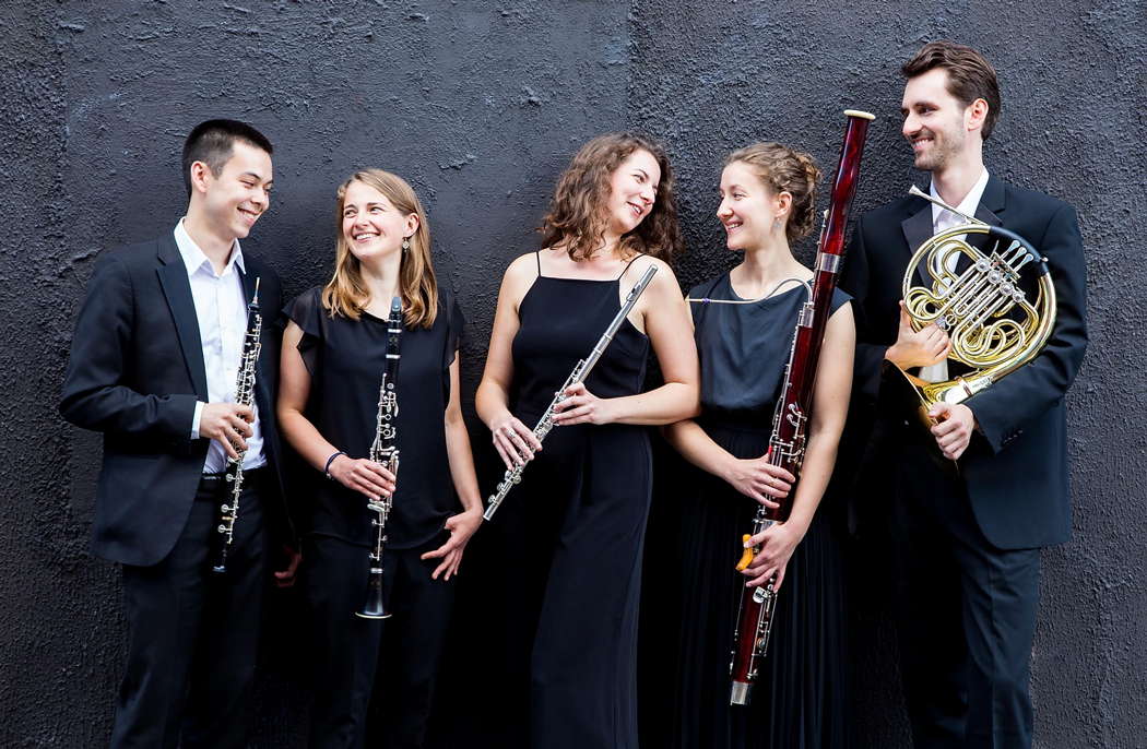 Cavendish Winds. Pictured, from left to right: Henry Clay, oboe, Mary Tyler, clarinet, Katy Ovens, flute, Alice Quayle, bassoon and Charlie Ransley, horn. Photo © Timothy Ellis. On 14 February 2020, the musicians playing were Katy Ovens, flute, Will Ball, oboe, Mary Tyler, clarinet, Catriona McDermid, bassoon and Maude Wolstenholme, horn