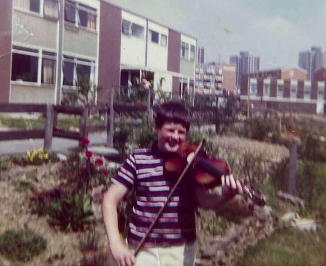A young Jim Hutton with his violin