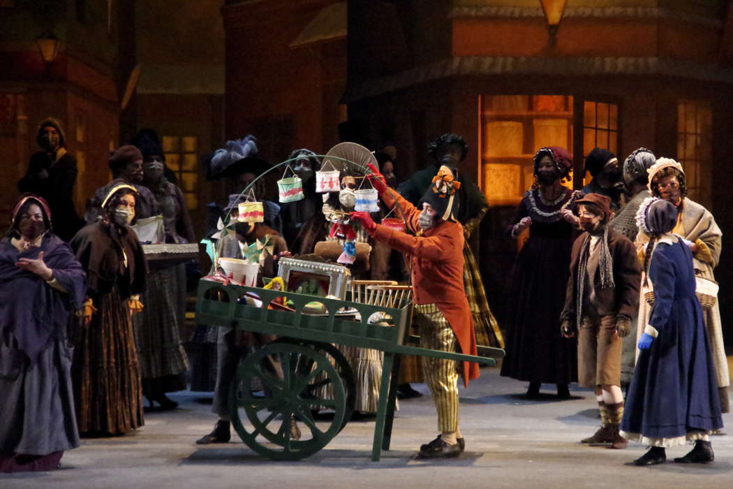 A scene from Act II of Giacomo Puccini's 'La bohème' at Teatro Regio Torino. Photo © 2021 Ivano Coviello