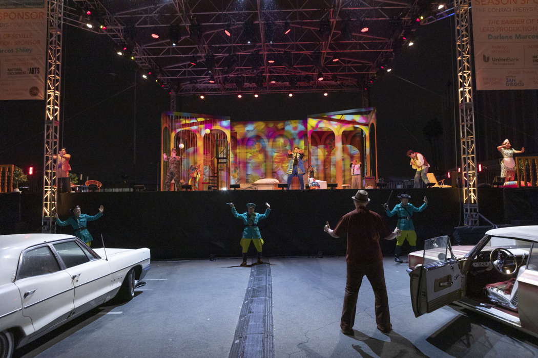 The San Diego Opera chorus in Rossini's 'The Barber of Seville' in Pechanga Arena San Diego parking lot. Photo © 2021 J Kat Woronowicz