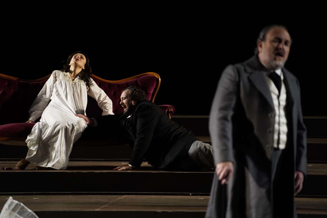 Irina Lungu as Violetta, Ştefan Pop as Alfredo Germont and Franco Vassallo as Giorgio Germont in Act III of 'La Traviata' at Teatro Massimo Bellini. Photo © 2021 Giacomo Orlando