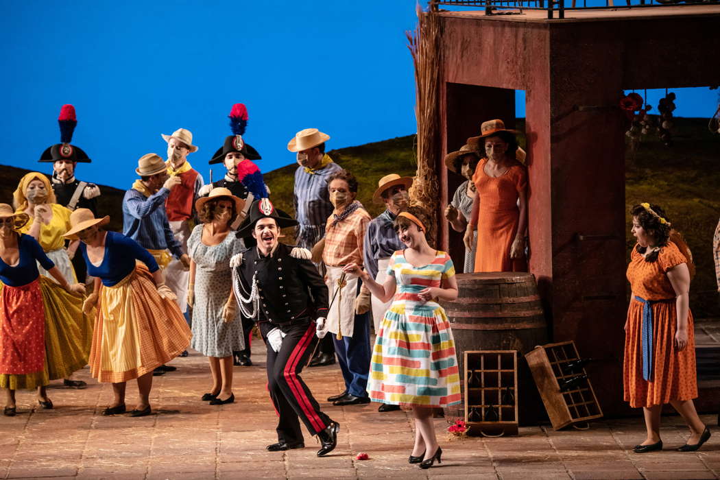 From left to right: Giorgio Caoduro as Belcore, Mariangela Sicilia as Adina and Ashley Milanese as Giannetta with members of the chorus in Donizetti's 'L'Elisir d'Amore' at Teatro Regio Torino. Photo © 2021 Andrea Macchia