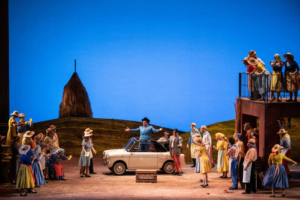 Marco Filippo Romano as Dulcamara and Mario Brancaccio as Dulcamara's assistant in Donizetti's 'L'Elisir d'Amore' at Teatro Regio Torino. Photo © 2021 Andrea Macchia