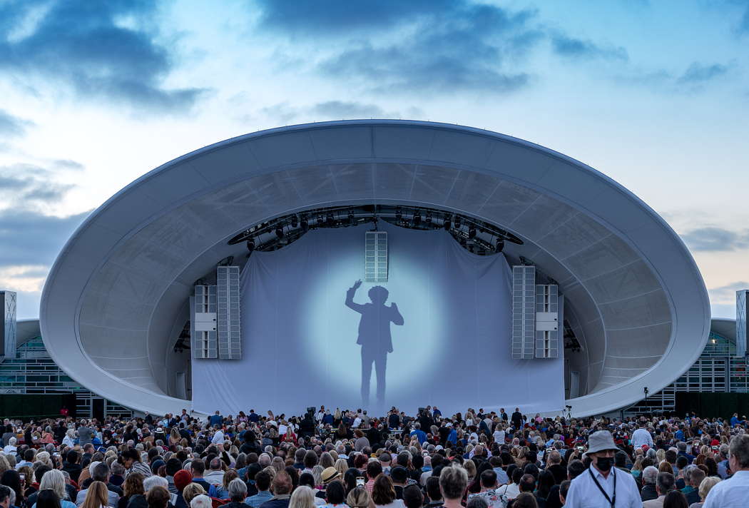 Rafael Payare in silhouette at the San Diego Symphony concert. Photo © 2021 Gary Payne