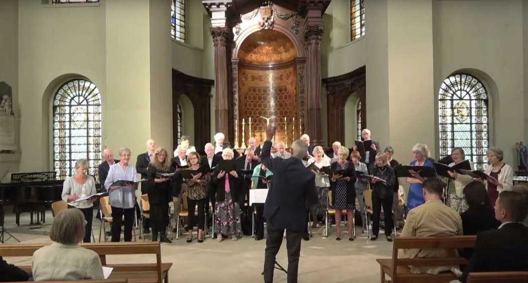 Remembering John Poole at St George's Church Bloomsbury, London UK on 18 September 2021, with Keith Bennett conducting the choir. Video screenshot © 2021 Keith Bramich