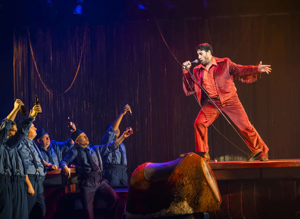 Phillip Rhodes as Escamillo with members of the Chorus of Opera North in Bizet's 'Carmen'. Photo © 2021 Tristram Kenton