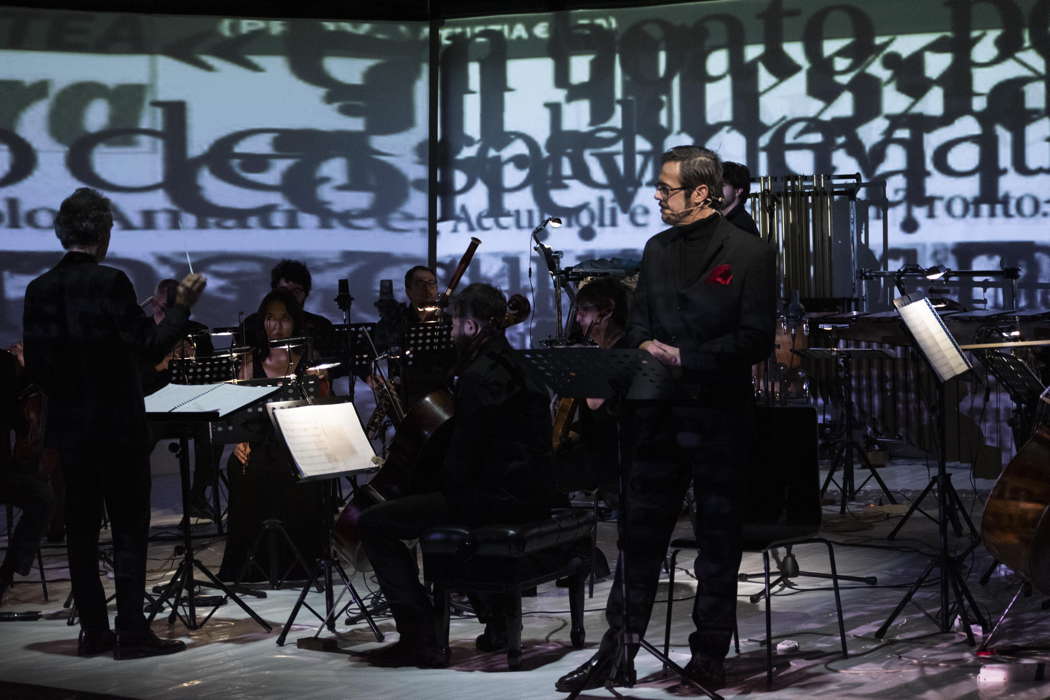 Gabriele Bonolis directingthe Bruno Maderna Ensemble with Claudio Gregori (right) performing Filotei's 'L'ultima estate'. Photo © 2021 Simone Scatarzi Alberti