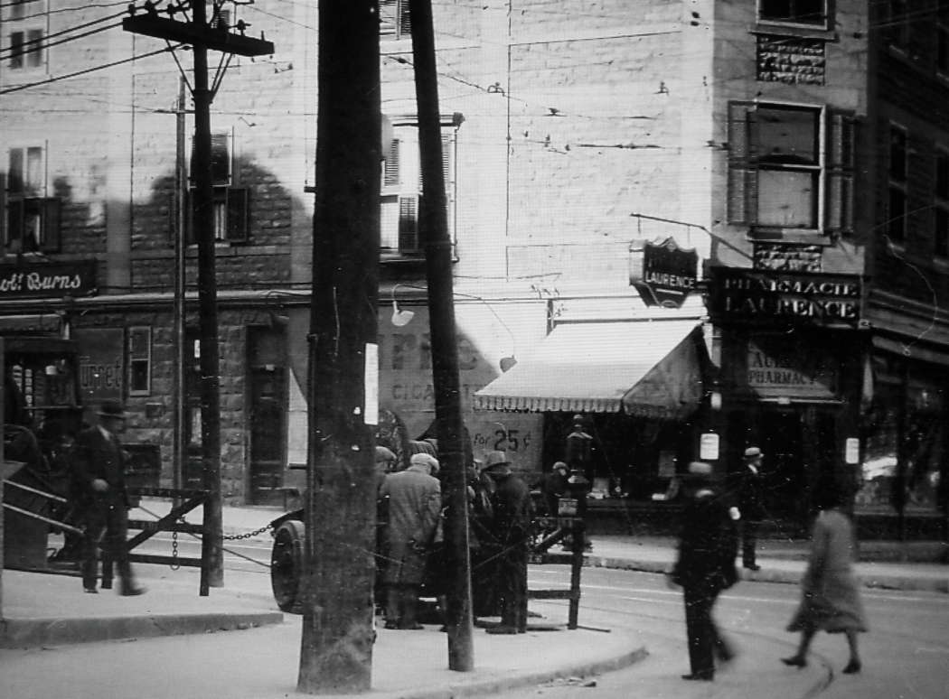 The corner of Rue Saint-Denis and Rue Ontario, Montreal, Quebec, Canada in 1937
