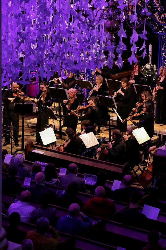 Members of Sinfonia Viva with part of the 'Peace Doves' art installation in Derby Cathedral on 4 May 2022. Photo © 2022 Ali J Photography