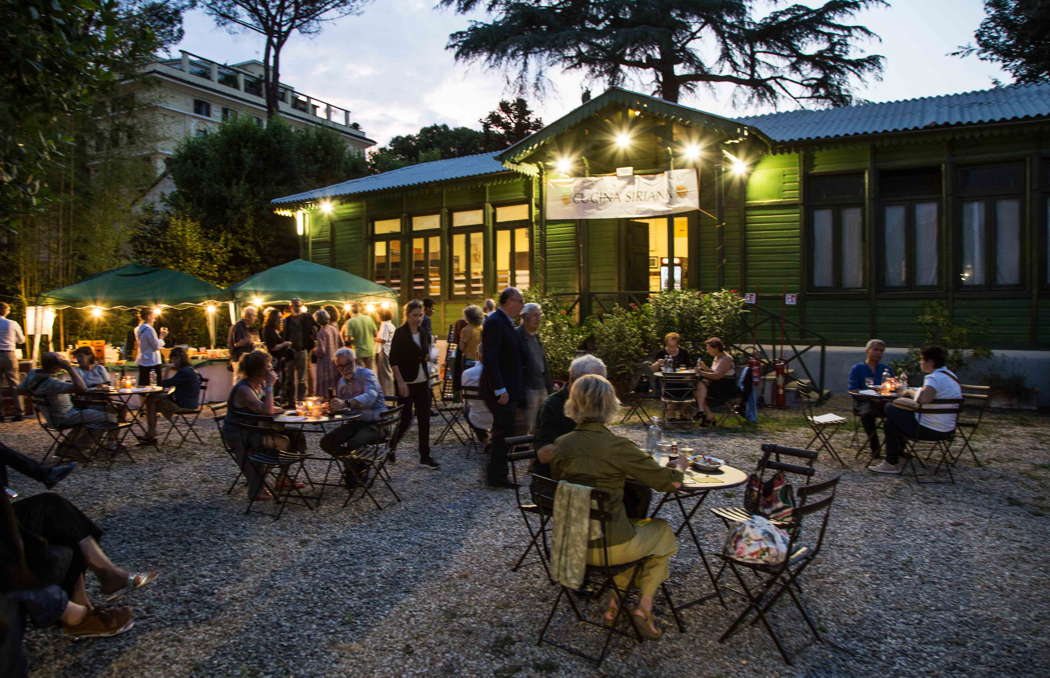 Audience members dining in the open-air restaurant in the gardens of the Roman Philharmonic Academy. Photo © 2022 Max Pucciariello