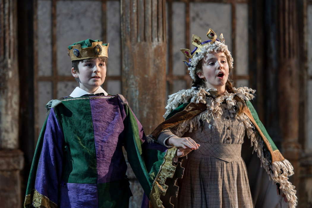 'When I am King, you shall be Queen'. Ben Fletcher as Miles and Maia Greaves as Flora dress up as royalty in Garsington's 'The Turn of the Screw'. Photo © 2022 Julian Guidera