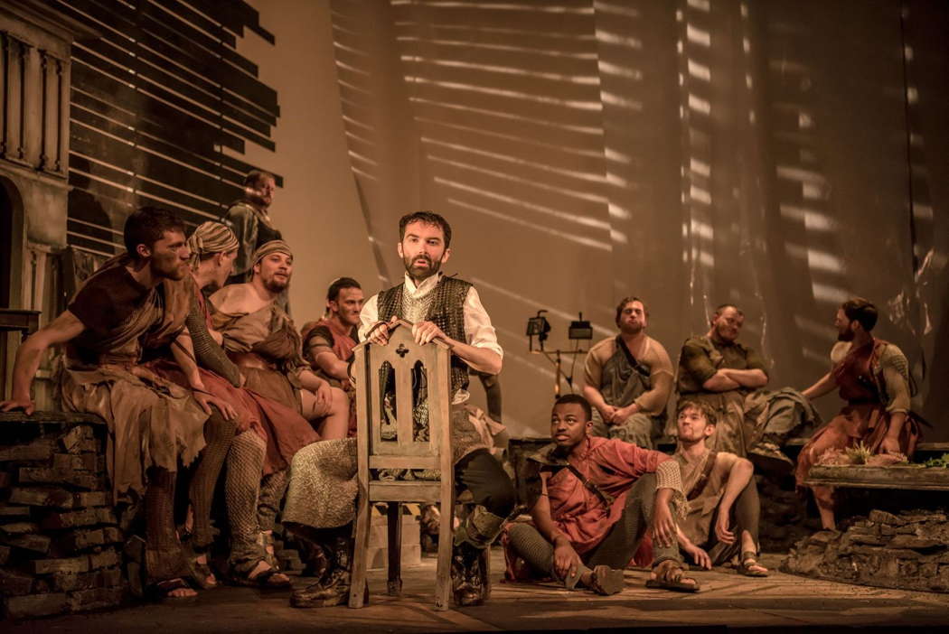 John Irvin as Rodrigo (sitting on a chair) in Buxton Festival's 'La Donna del Lago'. Photo © 2022 Genevieve Girling