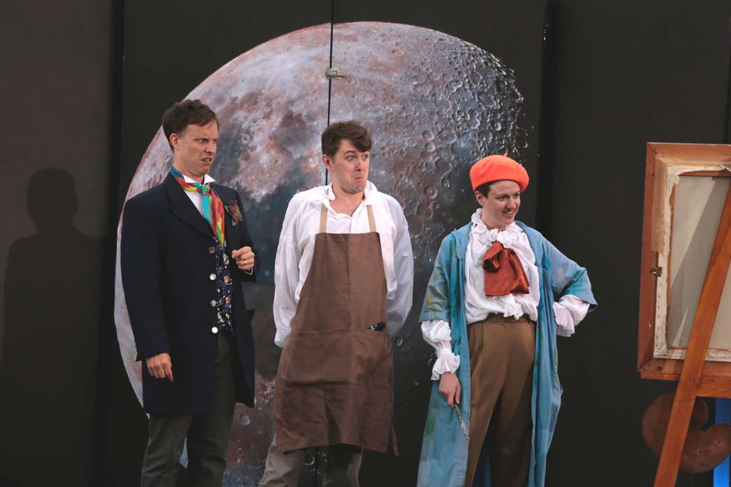 The mischievous Ecclitico (Nathan Vale) with his stooge Cecco (Sam Harris) and the lovelorn Ernesto (super travesti role from Catherine Backhouse) in Bampton Classical Opera's 'Fool Moon'. Photo © 2022 Anthony Hall