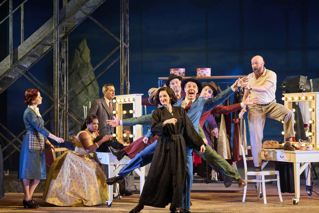 From left to right: Laura Kelly-McInroy as Dresser, Elizabeth Llewellyn as Prima Donna, Dean Robinson as Music Master, Jennifer France as Zerbinetta, Adrian Dwyer as Brighella, Alex Banfield as Scarmuccio, Simon Grange as Truffaldino (double) and Daniel Norman as Dancing Master in Opera North's 'Ariadne auf Naxos'. Photo © 2023 Richard H Smith