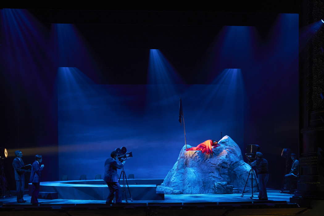 Elizabeth Llewellyn as Ariadne with members of the Chorus of Opera North in Opera North's 'Ariadne auf Naxos'. Photo © 2023 Richard H Smith