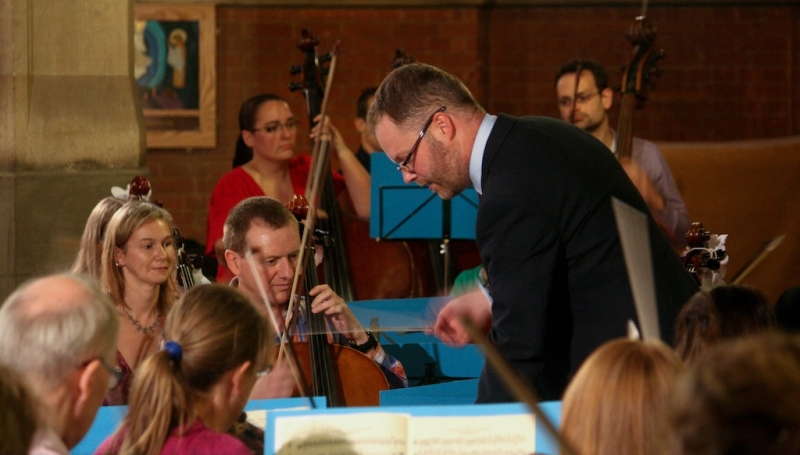 Conductor Keith Slade with members of the WSO. Photo © Paul Baker