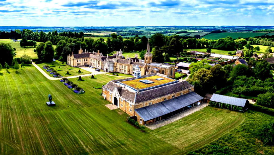 Leicestershire's Nevill Holt Opera from the air. The opera house is in the foreground, inside the historic stable block