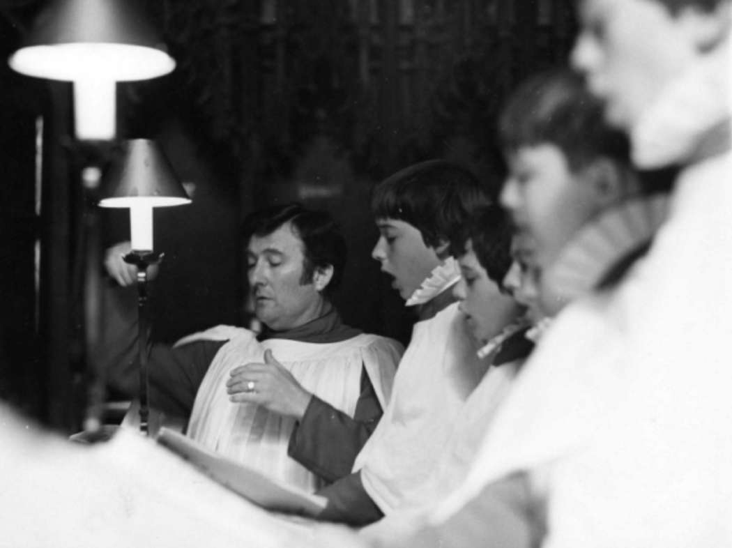 John Sanders with the choristers of Gloucester Cathedral. Photo courtesy of the Sanders Society, which runs an annual composition competition. Details at sanderssociety.org.uk