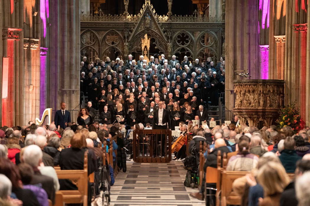 Worcester Festival Choral Society, soloists Julien Van Mellaerts and Rebecca Hardwick (far left) and conductor Samuel Hudson acknowledging the audience applause after their performance of Brahms' German Requiem in Worcester Cathedral on 25 November 2023. Photo © 2023 Michael Whitefoot
