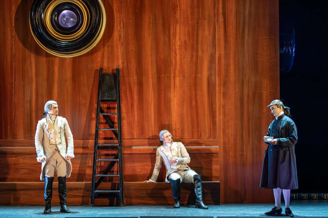Anthony Gregory as Ferrando, Henry Neill as Guglielmo and Quirijn de Lang as Don Alfonso in Tim Albery's production for Opera North of Mozart's 'Così fan tutte'. Photo © 2024 James Glossop