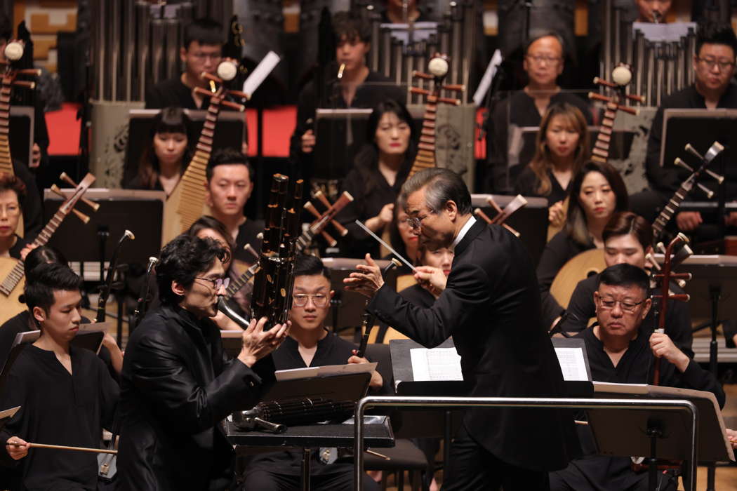 A scene involving the sheng from the Hong Kong Chinese Orchestra's Music about China: A Dialogue Between the Bianzhong and the Organ