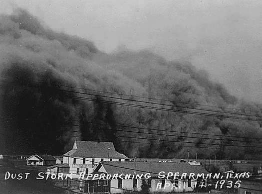 A dust storm approaching Spearman, Texas on 14 April 1935 (US National Archives)