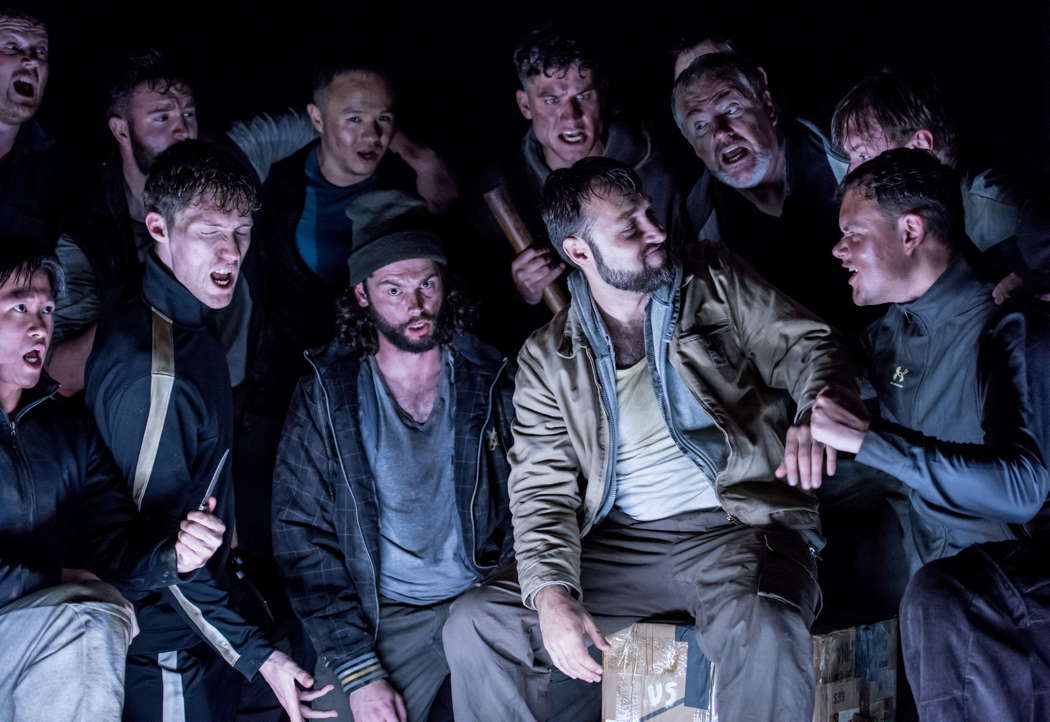 Roman Arndt as Ernani (centre right) with members of the chorus in the Buxton Festival production of Verdi's 'Ernani'. Photo © 2024 Genevieve Girling