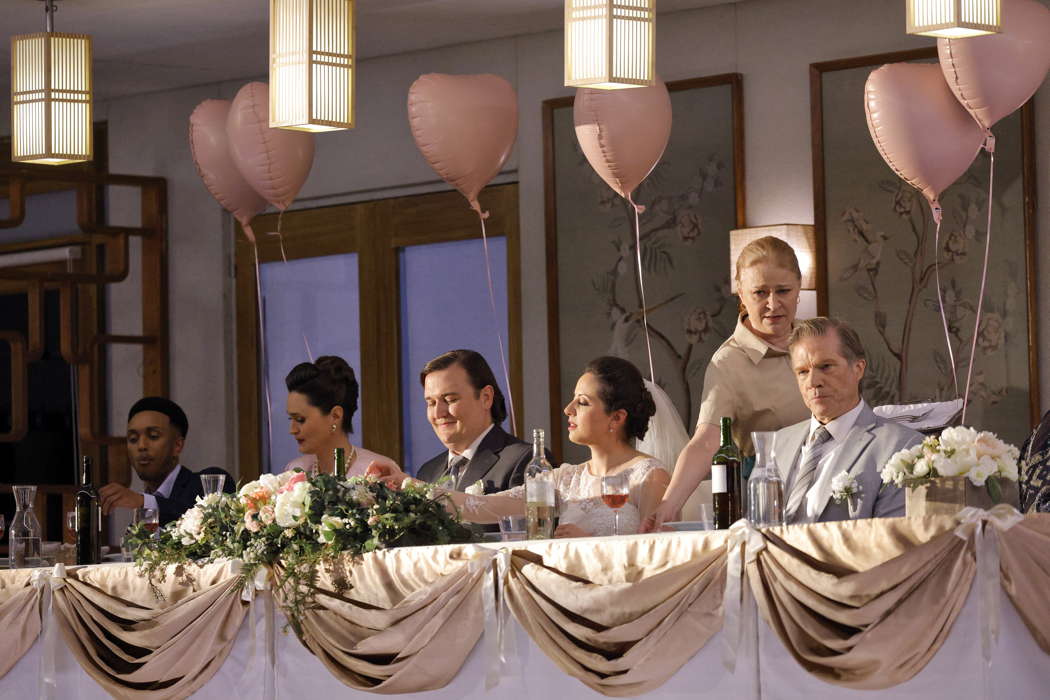 From right to left: Rod Gilfry as the Father-in-Law (Henrik), Ruxandra Donose as the Waitress (Tereza), Lilian Farahani as the Bride (Stela), Miles Mykkanen as the Bridegroom (Tuomas) and Claire de Sévigné as the Mother-in-Law (Patricia) in 'Innocence' by Kaija Saariaho, Sofi Oksanen and Aleksi Barrière at San Francisco Opera. Photo © 2024 Cory Weaver