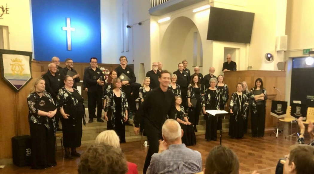 Dexter Drown and the Sitwell Singers acknowledging applause at their 'Special Relationship' concert