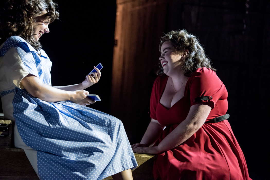 Niamh O'Sullivan as Carmen and Erin Rossington as Micaëla in 'La Tragédie de Carmen' at the Buxton Festival. Photo © 2024 Genevieve Girling