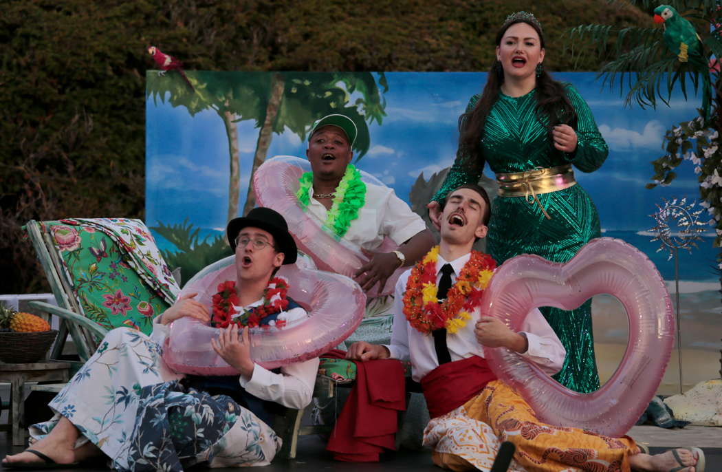General chaos - The Englishman James (Magnus Walker), the splendidly characterful, beautifully voiced Italian Brunoro (Monwabisi Lindi), the wildly enthusiastic Don Lopes (Jonathan Eyers) and (above) Alcina (Inna Husieva) trying to keep control, in Gazzaniga's 'L'isola d'Alcina' at Bampton Classical Opera. Photo © 2024 Anthony Hall