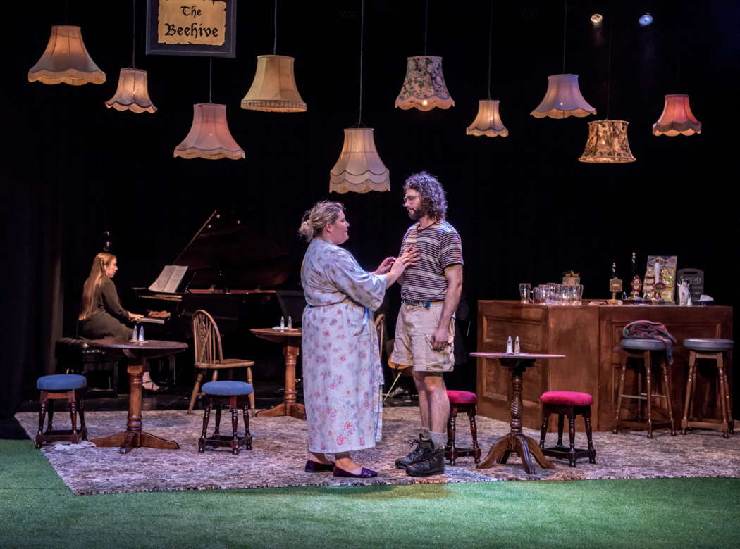 From left to right: Rebecca Warren, piano, Elizabeth Findon as Mrs Waters and Theo Perry as Ned Travers in Ethel Smyth's 'The Boatswain's Mate' at the Buxton Festival. Photo © 2024 Genevieve Girling