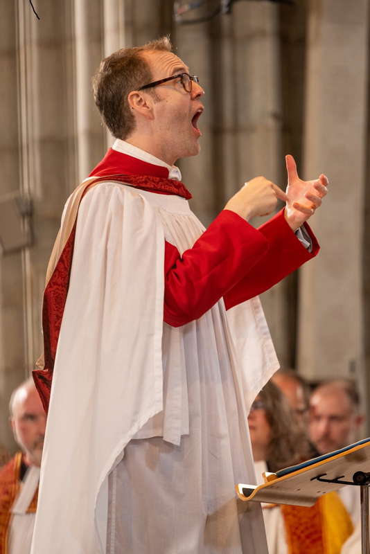 Samuel Hudson conducting the opening celebration of the 2024 Worcester Three Choirs Festival. Photo © 2024 Dale Hodgetts