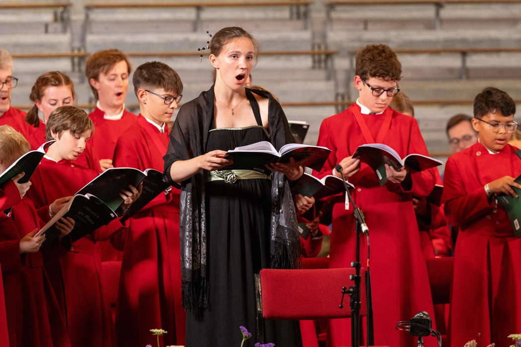 Boy and girl choristers with soprano Florence Price perform together for Bob Chilcott's highly dramatic, bracing and powerful oratorio 'The Angry Planet'. Photo © 2024 Dale Hodgetts