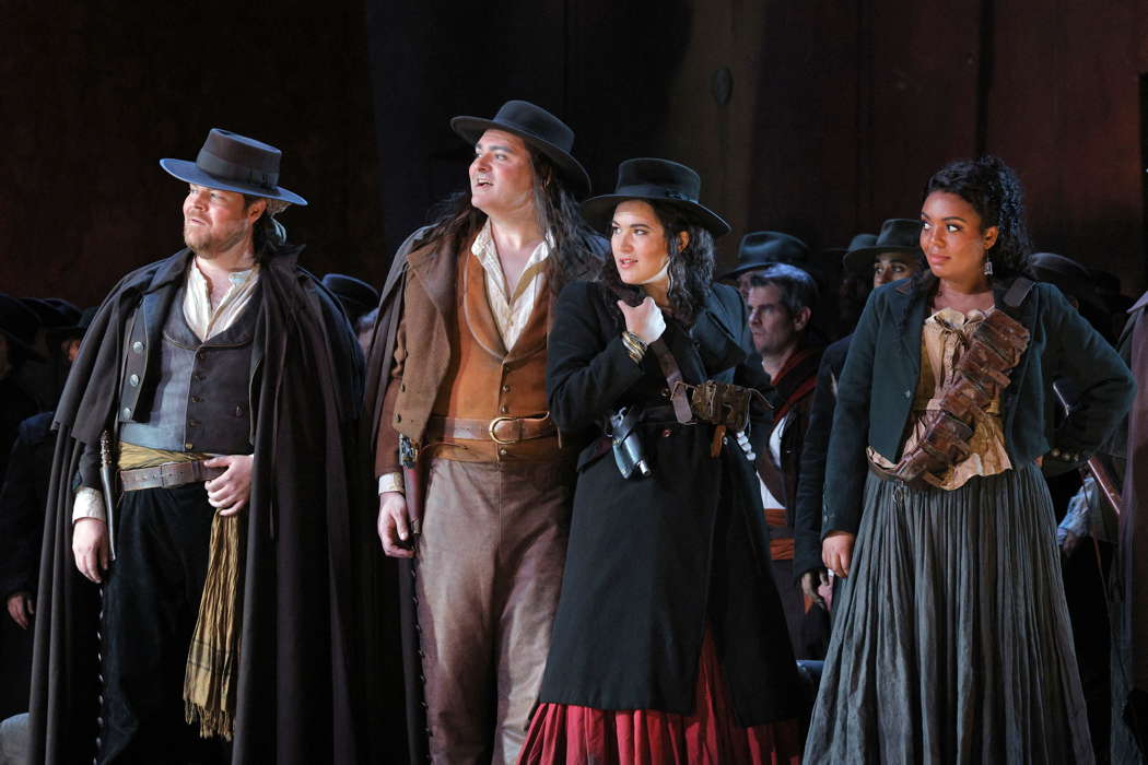 From left to right: Christopher Oglesby as Dancaïre, Alex Boyer as Remendado, Nikola Printz as Mercédès and Arianna Rodríguez as Frasquita in Bizet's 'Carmen' at San Francisco Opera. Photo © 2024 Cory Weaver
