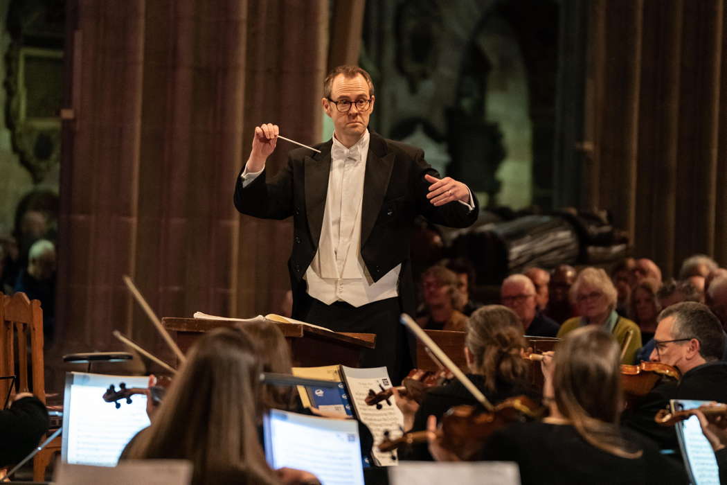 Samuel Hudson conducting Worcester Festival Choral Society and Meridian Sinfonia. Photo © 2024 Michael Whitefoot