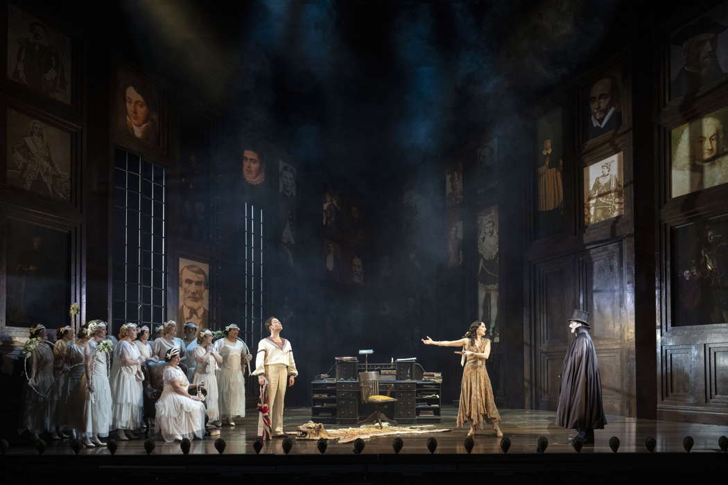 The ladies of the Chorus of Opera North with Xavier Hetherington as Richard Dauntless, Amy Freston as Rose Maybud and Dominic Sedgwick as Sir Ruthven Murgatroyd in Opera North's production of Gilbert & Sullivan's comic opera 'Ruddigore'. Photo © 2024 Richard H Smith